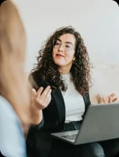 Team member in conversation